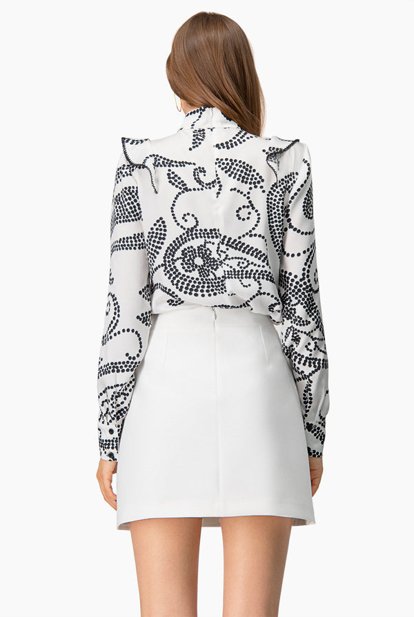 Blusa de manga larga con escarolas y escote en V