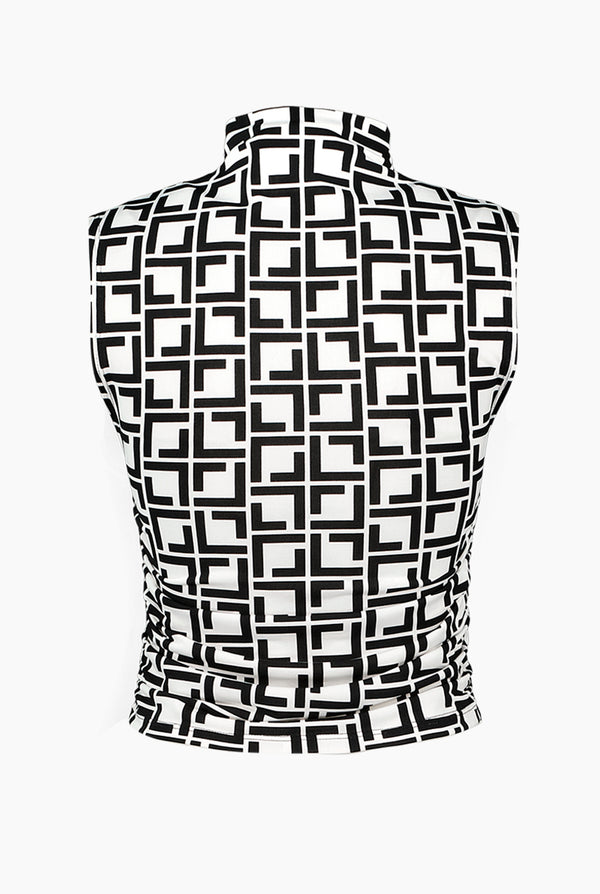 Blusa estampada sin mangas y cuello alto