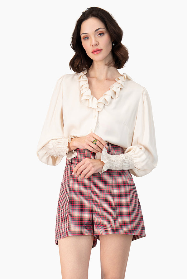 Blusa con escote en V y escarolas