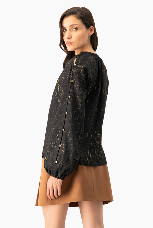 Blusa de manga larga amplia