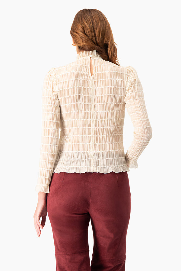 Blusa manga larga con textura
