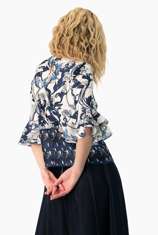 Blusa manga 3/4 con olanes