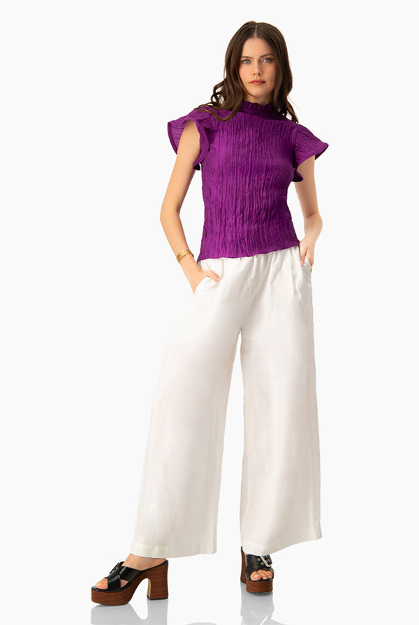 Blusa recta en tono morado