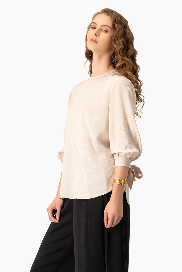 Blusa recta de manga con amarre
