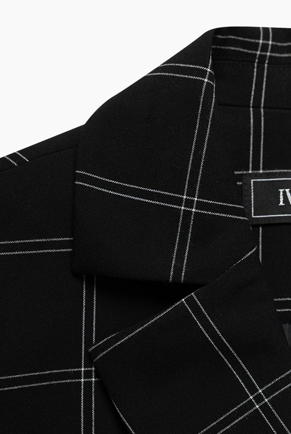 Saco corto negro con estampado de rayas y botones frontales
