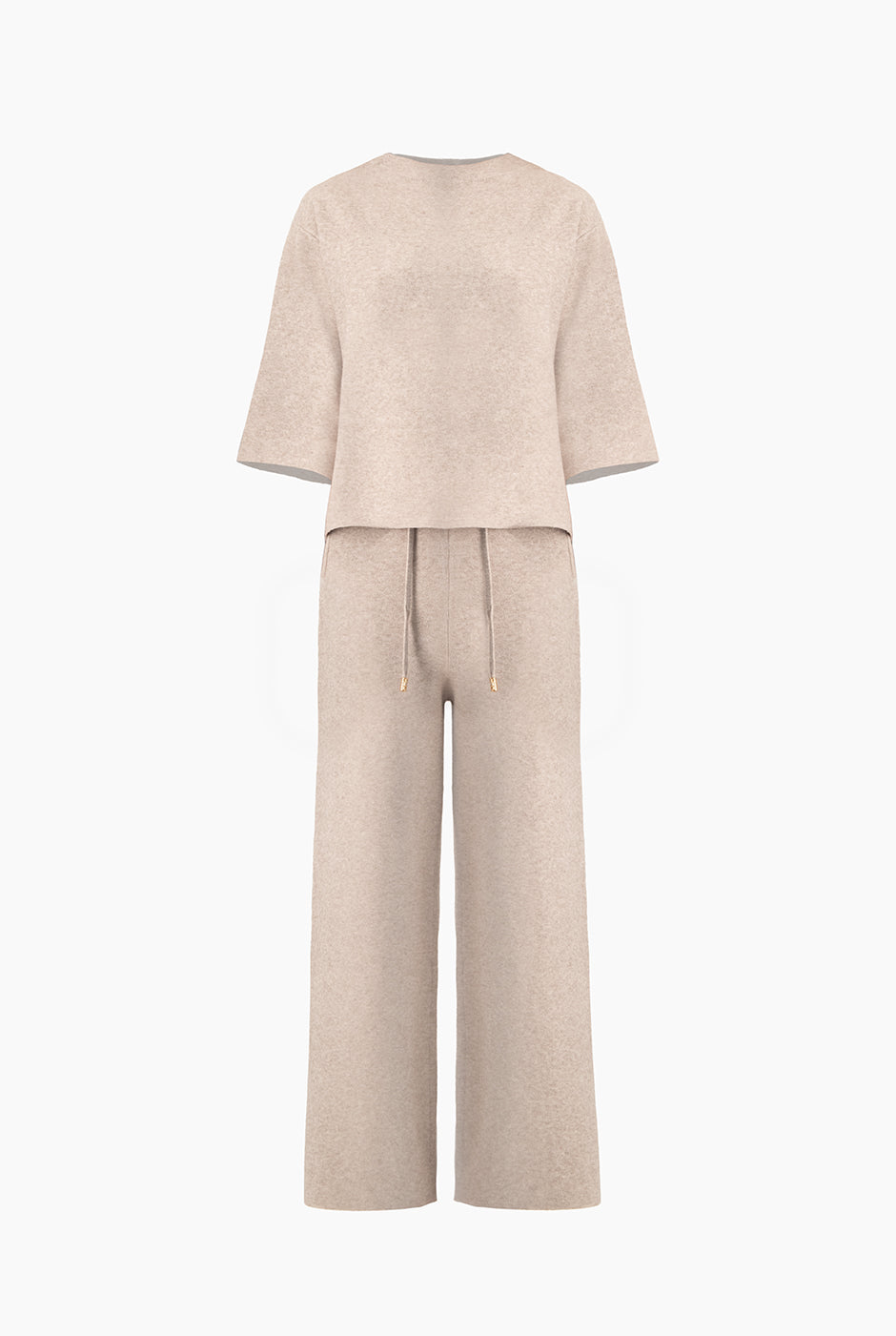 Conjunto suéter con perlas y pantalón elástico natural