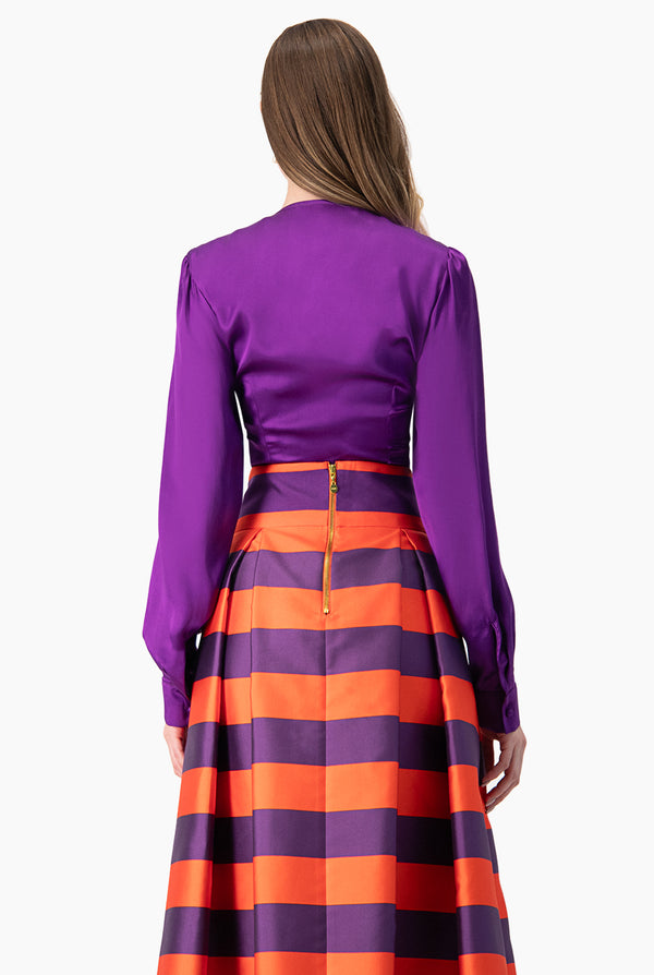 Blusa corta cruzada de manga larga