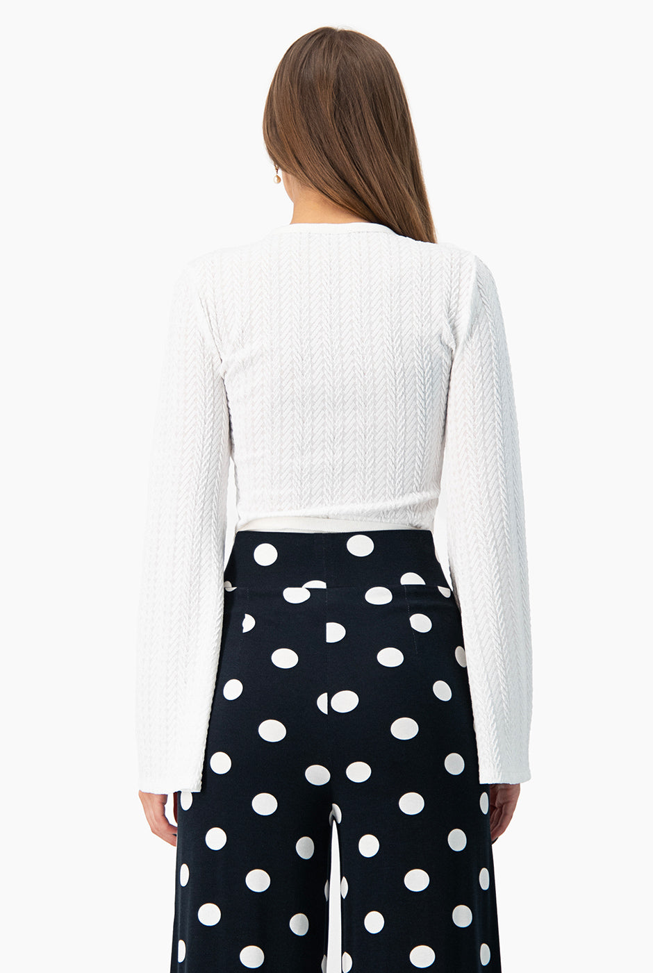 Blusa tejida con manga larga acampanada y escote en V