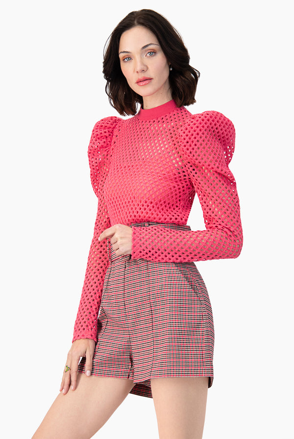 Blusa con hombro abullonado y manga larga