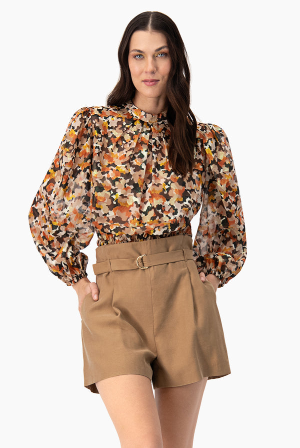 Blusa recta de manga larga amplia