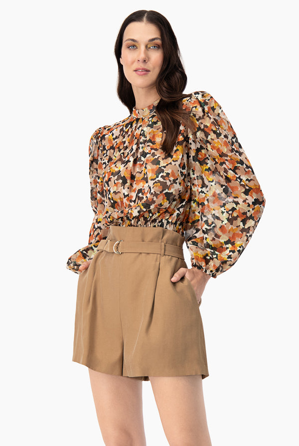 Blusa recta de manga larga amplia
