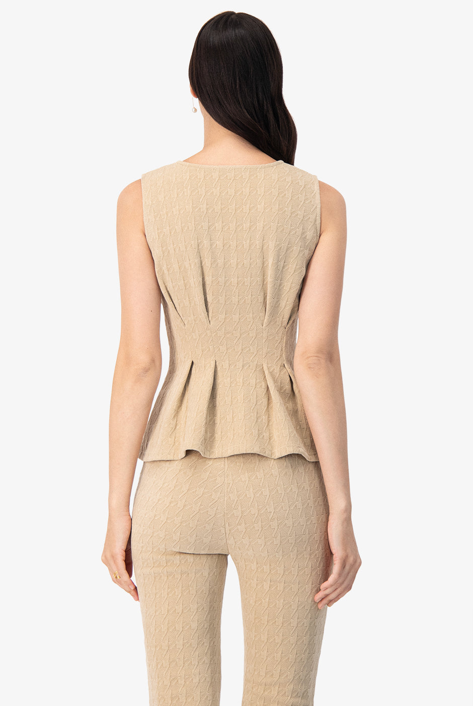 Blusa peplum sin mangas color beige