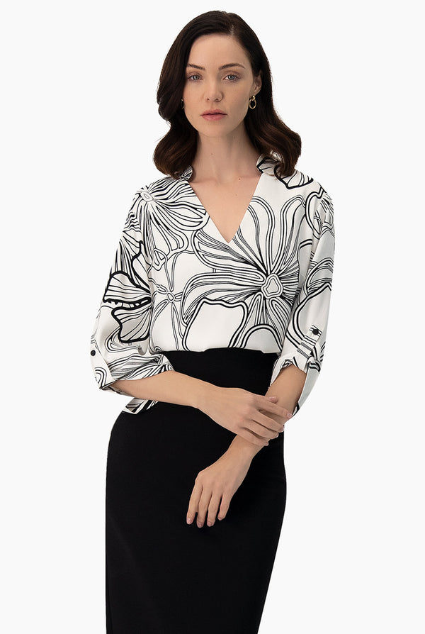 Blusa con elevadores en mangas