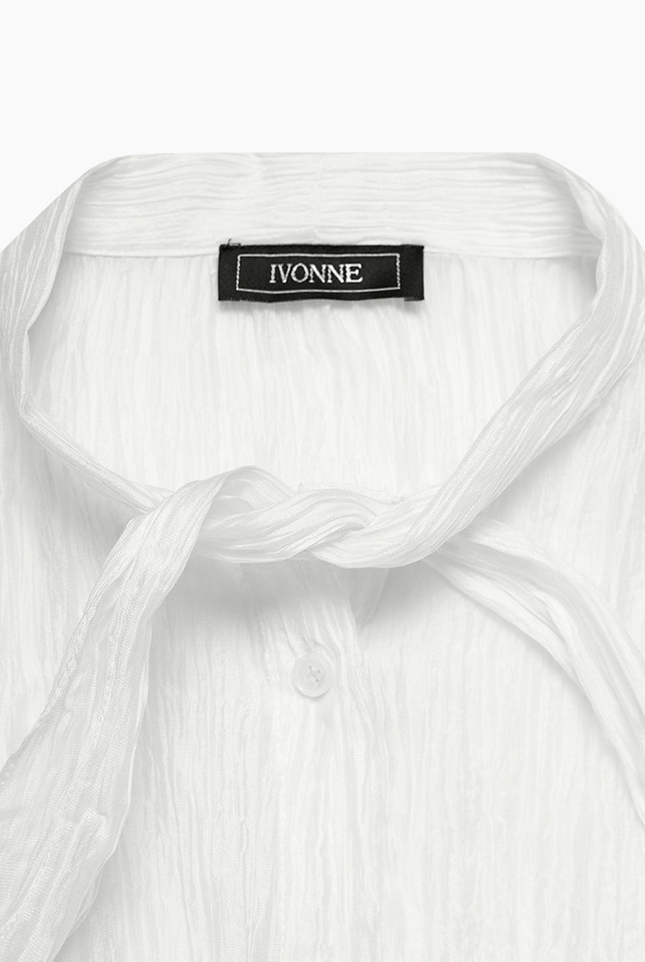 Blusa blanca de moño en cuello de Ivonne, manga larga y estilo recto