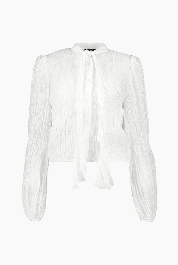 Blusa blanca de moño en cuello