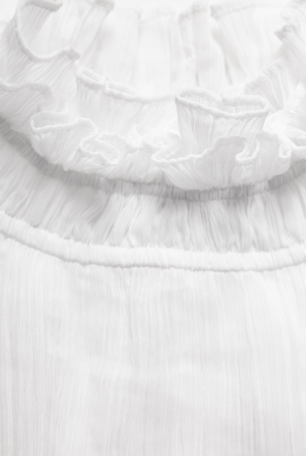 Blusa blanca de cuello alto