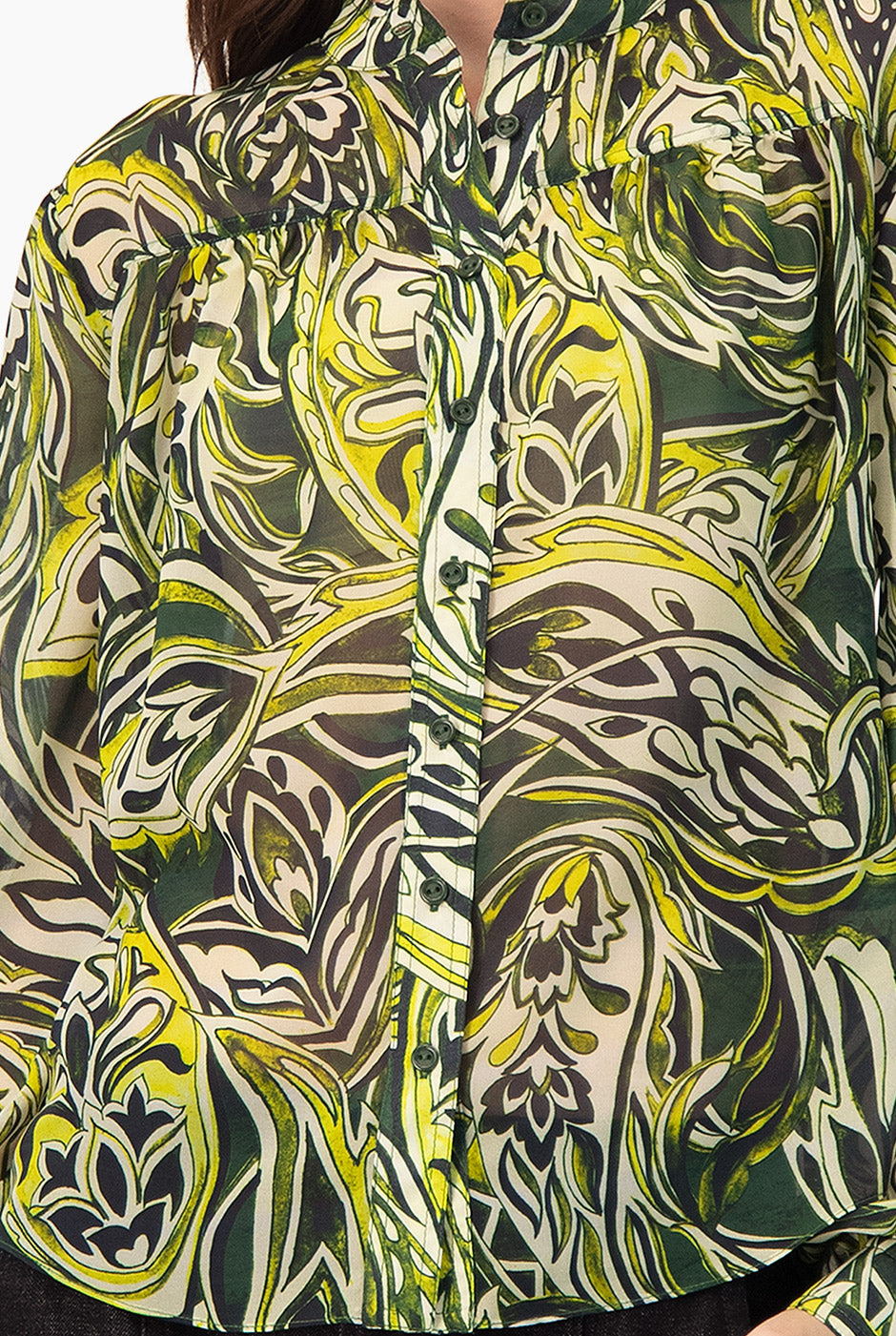 Blusa estampada verde con cuello redondo y mangas largas