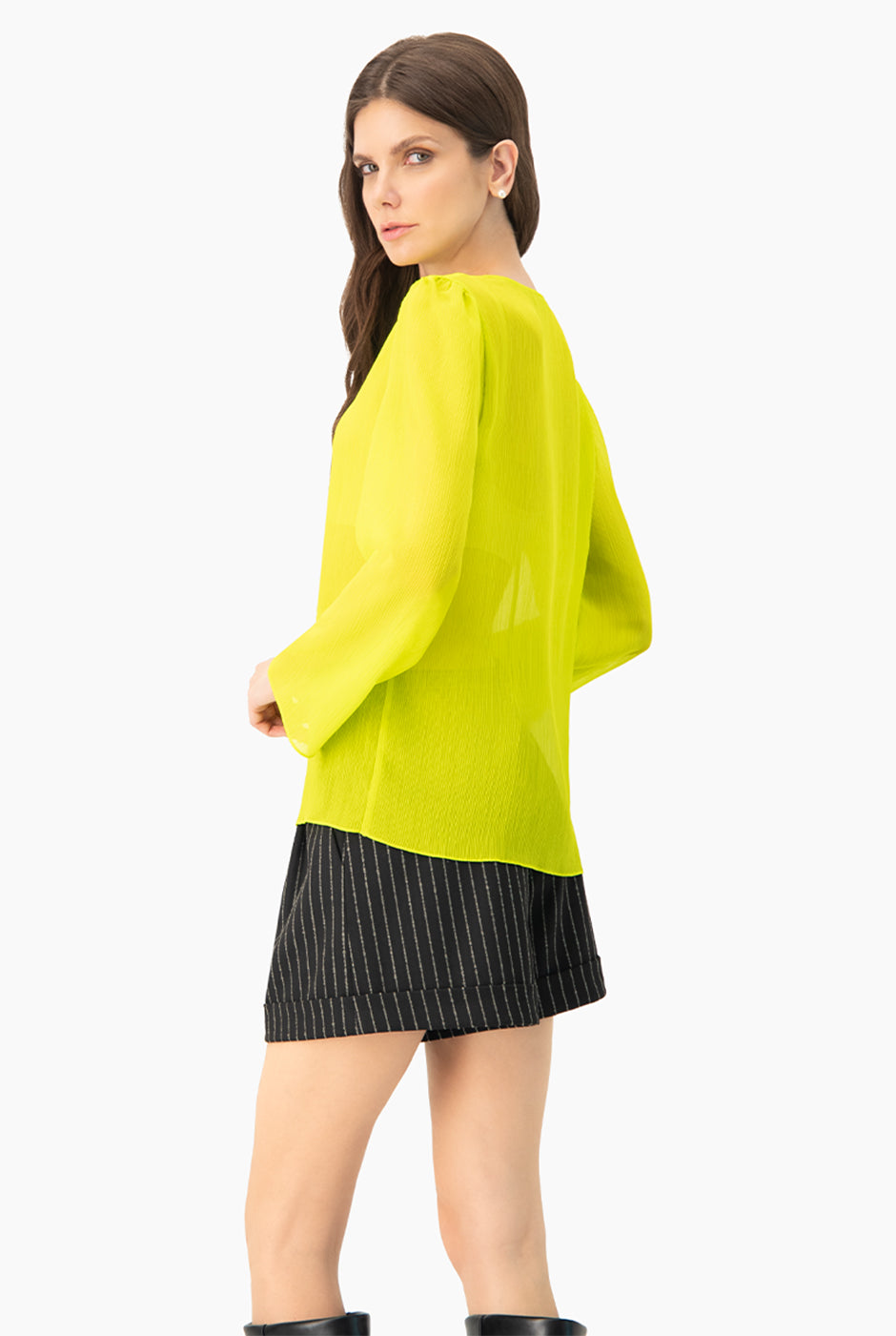 Blusa larga verde con escote V y mangas largas