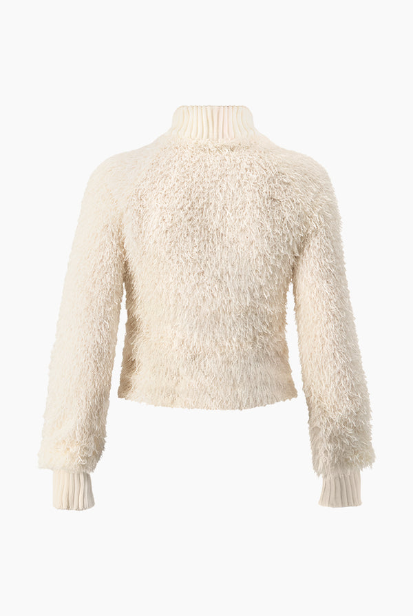 Blusa de flecos y manga larga