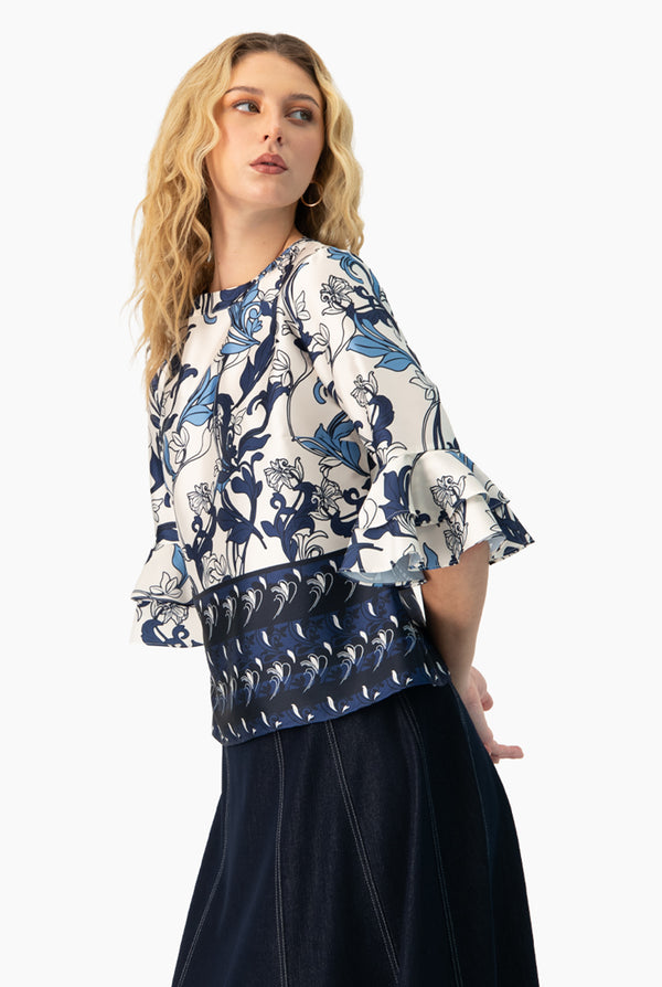Blusa manga 3/4 con olanes