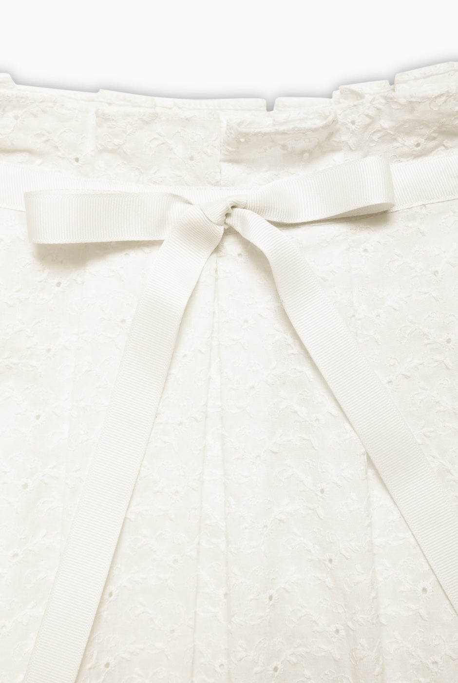 Maxi falda blanca con cinta de Ivonne, elegante y sofisticada.