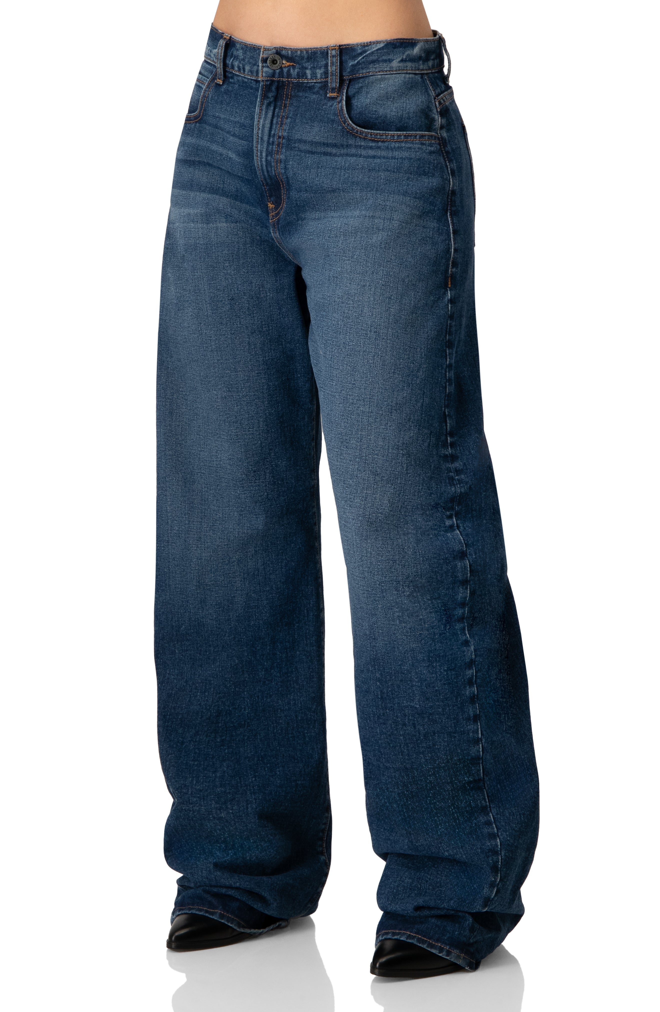 Jeans amplios de denim azul con bolsillos y botón frontal