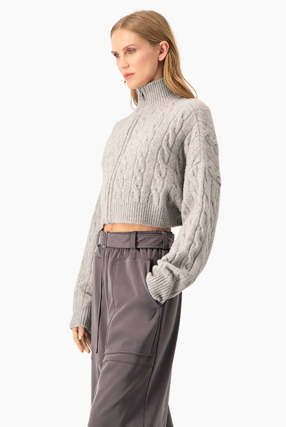 Suéter cable crop jaspe con trenzado y zipper